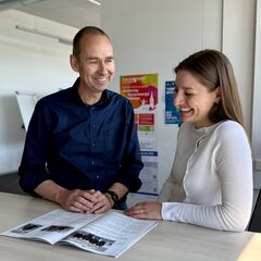 The patent agent advises a member of staff on patents