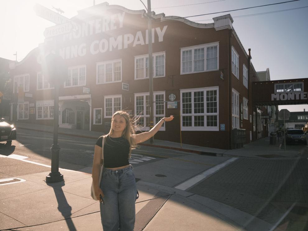 Ellen Thomas in front of a building in Monterey