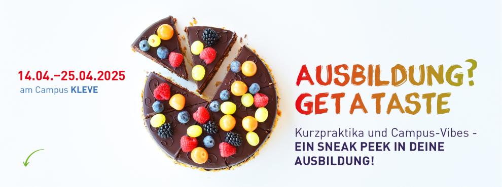 Torte mit Schokoladenguss und vielen bunten Früchten. Es sind die Farben der Fakultäten.