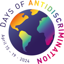 Logo of Days of Antidiscrimination. April 15 to 19, 2024. A dark-blue globe with rainbow-colored continents.